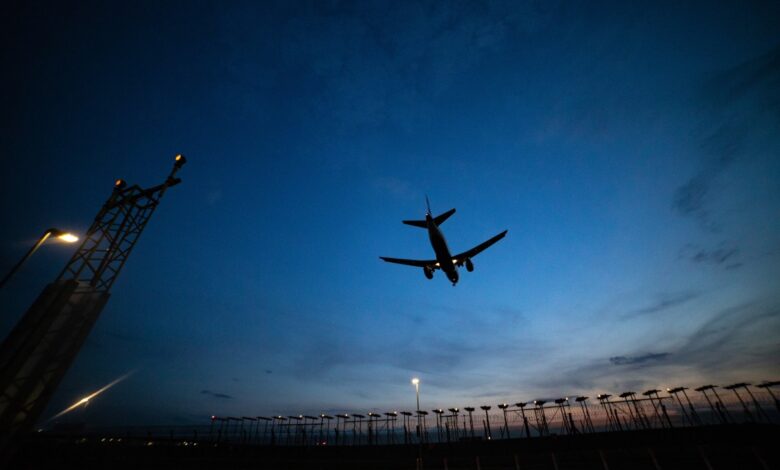 plan flying at dusk